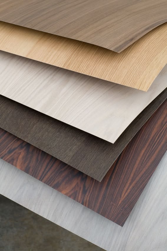 Layered decorative wood veneer sheets